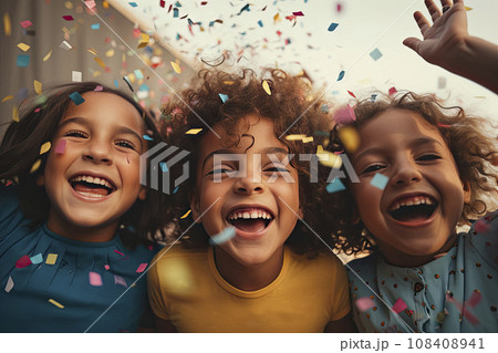 Happy multicultural children having fun celebrating their birthdays with colorful confetti Happy multicultural children having fun celebrating their birthdays with colorful confetti 108408941