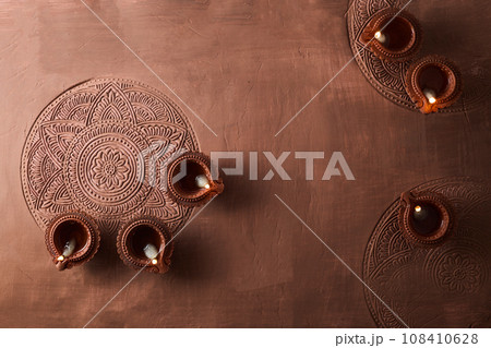 Burning diya on Happy Diwali, background for light festival of India 108410628