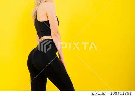 Young woman, posing in the studio. Advertising sportswear and yoga wear. Healthy lifestyle, sport Young woman, posing in the studio. Advertising sportswear and yoga wear. Healthy lifestyle, sport 108411862