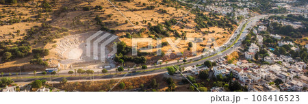 Aerial photo of massive ancient theatre of Halicarnassus, Bodrum, Turkey with road crossing town. historical places 108416523