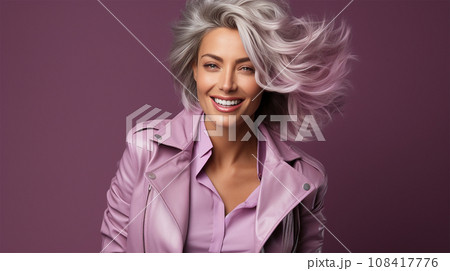 beautiful model 50-60 years old on a lilac background beautiful model 50-60 years old on a lilac background 108417776