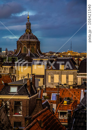 Cityscape of Amsterdam, old type buildings and channels 108421540