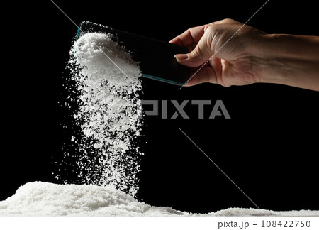 Smart mobile phone fall under beneath snow ice winter. Lost mobile phone with blank screen on winter snow on the road. Snow fall from phone, hand pick up. Black background isolated Smart mobile phone fall under beneath snow ice winter. Lost mobile phone with blank screen on winter snow on the road. Snow fall from phone, hand pick up. Black background isolated 108422750