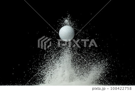 Golfer training practice in middle of snow night. Sport training golf ball falling down snow, heavy big small size snows. Freeze shot on black background isolated overlay. Golfer training practice in middle of snow night. Sport training golf ball falling down snow, heavy big small size snows. Freeze shot on black background isolated overlay. 108422758