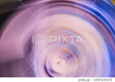 Smoky purple artistic blur with outer dark blue rim of ripple drop in abstract art Smoky purple artistic blur with outer dark blue rim of ripple drop in abstract art 108426978