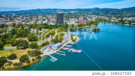 Aerial Lake Merritt Boating Center with Pelican Island and residential area of Oakland City 108427393