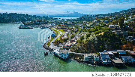Racoon Strait around Tiburon city with houses on hillside wide aerial with Corinthian Yacht Club Racoon Strait around Tiburon city with houses on hillside wide aerial with Corinthian Yacht Club 108427572