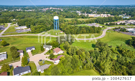 Aerial wide view Columbia City with view over culdesac in neighborhood with few houses 108427617