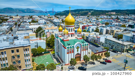Aerial Holy Virgin Cathedral with Golden Gate Bridge in background Aerial Holy Virgin Cathedral with Golden Gate Bridge in background 108427960