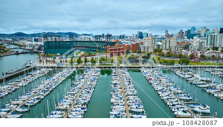Aerial South Beach Harbor looking at Oracle Park with San Francisco skyline 108428087