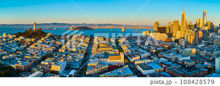 Gorgeous panorama at golden hour with Coit Tower to Transamerica Pyramid skyscraper buildings 108428579