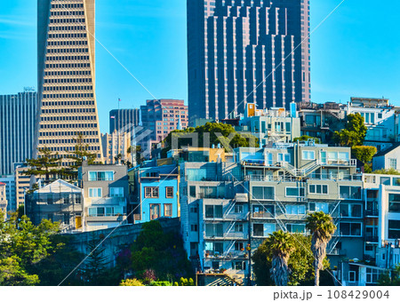Aerial panorama sunny San Francisco apartment buildings with downtown skyscrapers Aerial panorama sunny San Francisco apartment buildings with downtown skyscrapers 108429004