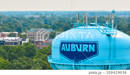 Close up of Auburn water tower with Dekalb County Court House in background aerial Close up of Auburn water tower with Dekalb County Court House in background aerial 108429036