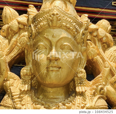 Balinese Hindu God golden Shiva Durga statue on a sacred Hindu temple in Indonesia 108434525