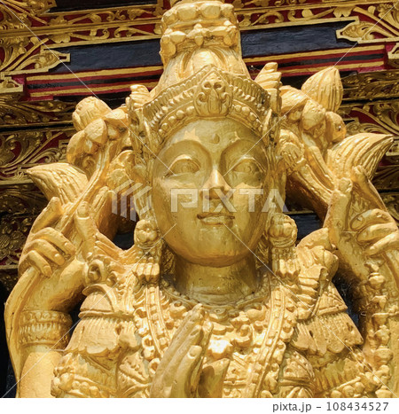 Balinese Hindu God golden Shiva Durga statue on a sacred Hindu temple in Indonesia 108434527