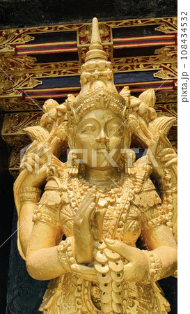 Balinese Hindu God golden Shiva Durga statue on a sacred Hindu temple in Indonesia 108434532