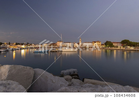 Picture over the harbor of Fazana in Istria in the evening during sunset 108434608