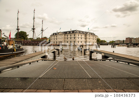 modern Amsterdam city center, canals and bridges. modern Amsterdam city center, canals and bridges. 108436373