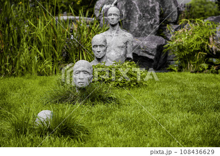 sculptural group of a man goes underground. sculptural group of a man goes underground. 108436629