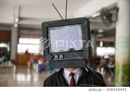 Man with TV smiling face and antenna head 108439445