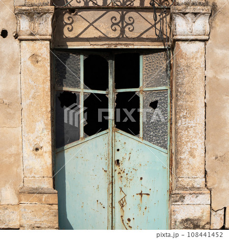 Window with a broken glass in an ancient building Window with a broken glass in an ancient building 108441452