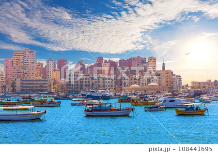 Seashore view of Alexandria, Manar A-Islam Mosque and traditional live buildings, Egypt Seashore view of Alexandria, Manar A-Islam Mosque and traditional live buildings, Egypt 108441695