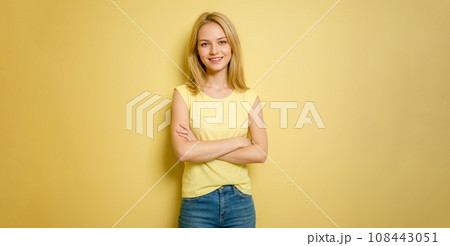 young woman portrait isolated on yellow. Photo of ecstatic lady in casual clothes smiling isolated bright shine color background young woman portrait isolated on yellow. Photo of ecstatic lady in casual clothes smiling isolated bright shine color background 108443051