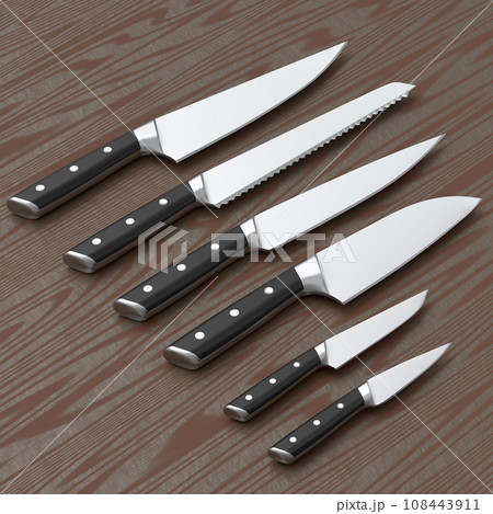 Set of chef's kitchen knives on wooden board or background. 108443911