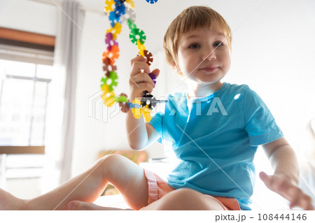 Photo of a Curious Child Contemplating the World from His Bedroom in parents bedroom 108444146