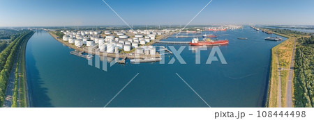 Panoramic drone picture from port Rotterdam with big transport ships 108444498