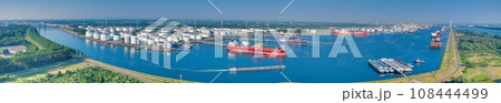 Panoramic drone picture from port Rotterdam with big transport ships Panoramic drone picture from port Rotterdam with big transport ships 108444499