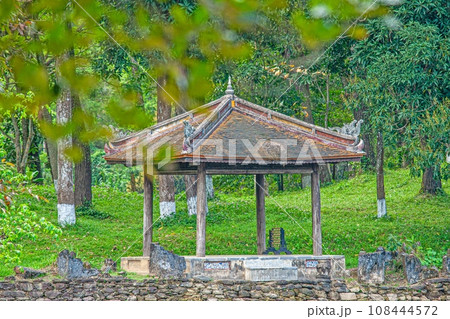 Image of a typical Asian resting place in an exotic garden in the Vietnamese city of Hue Image of a typical Asian resting place in an exotic garden in the Vietnamese city of Hue 108444572