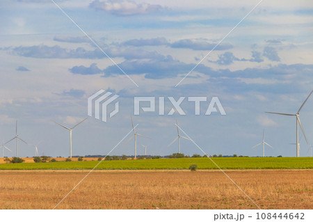 Wind turbines in a field. Renewable energy Wind turbines in a field. Renewable energy 108444642