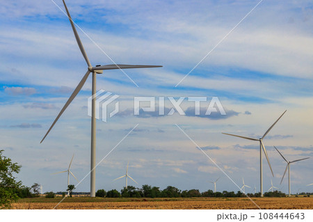 Wind turbines in a field. Renewable energy 108444643