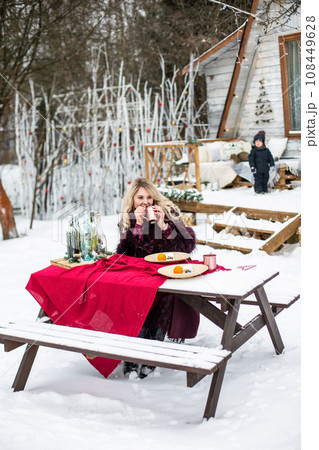 portrait of a young girl in the winter drink 108449628