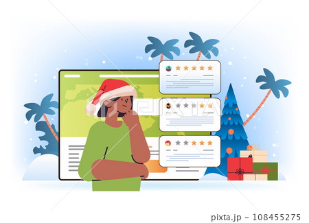 woman in santa claus hat reading testimonials or leaving comments consumer review for comment and rate service or goods customer feedback 108455275
