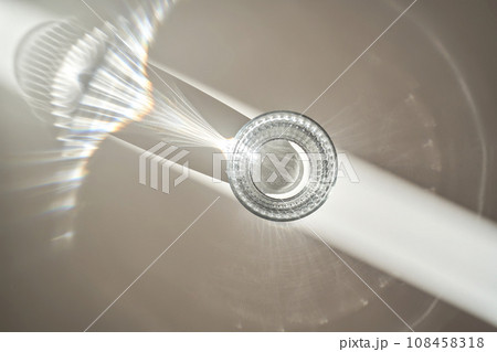 A glass of clean drinking water in the morning sun. A glass of clean drinking water in the morning sun. 108458318