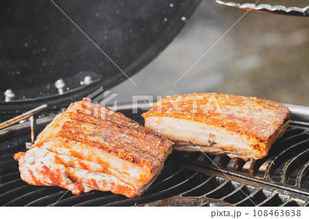 Crispy pork on grill 108463638
