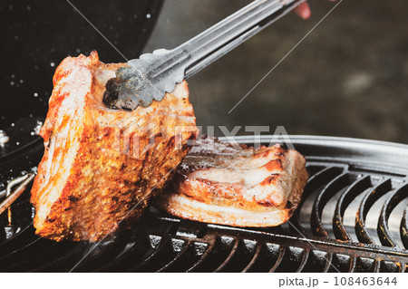 barbecue camping with grill crispy pork at night 108463644