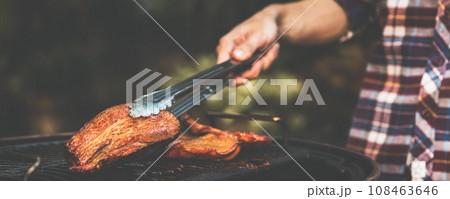 barbecue camping with grill crispy pork at night 108463646