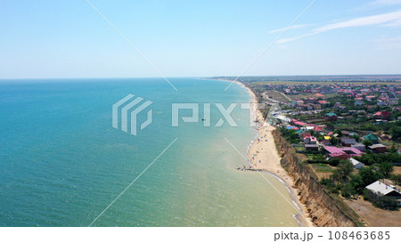 Panorama of sea shore in South Ukraine, Europe. Resort city with nice sand beach and clear blue sea. travel destination, ideal place for comfort vacation on black Sea. Drone photo Panorama of sea shore in South Ukraine, Europe. Resort city with nice sand beach and clear blue sea. travel destination, ideal place for comfort vacation on black Sea. Drone photo 108463685