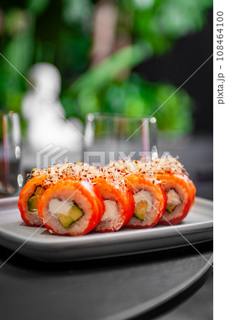 Classic Philadelphia sushi roll set with salmon and cream cheese. Classic Philadelphia sushi roll set with salmon and cream cheese. 108464100