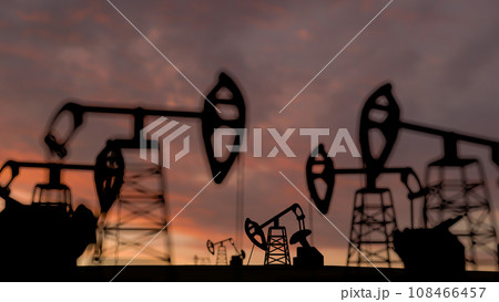 The silhouette of oil pumps in a large oil field at sunrise. 3d rendering. 3d illustration The silhouette of oil pumps in a large oil field at sunrise. 3d rendering. 3d illustration 108466457