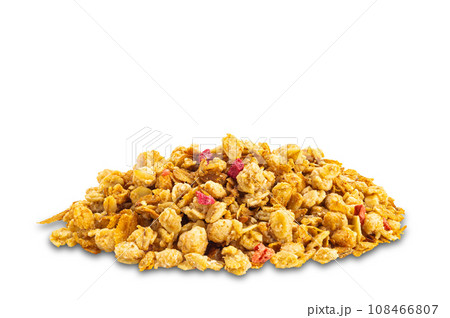 Pile of dry crunchy muesli with strawberry and raspberry isolated on white background. Pile of dry crunchy muesli with strawberry and raspberry isolated on white background. 108466807