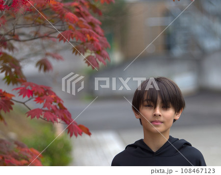 boy in hooded sweatshirt boy in hooded sweatshirt 108467123