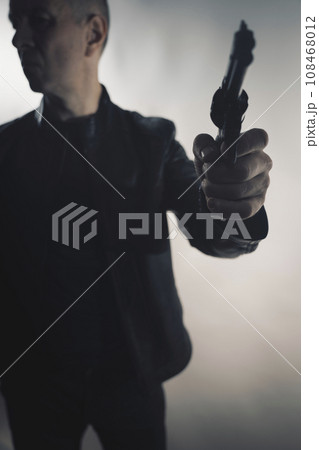 Detective spy thriller man with gun photo 108468012