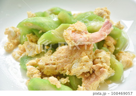 stir fried ridge gourd with egg stuffed shrimp in soy sauce on plate stir fried ridge gourd with egg stuffed shrimp in soy sauce on plate 108469057