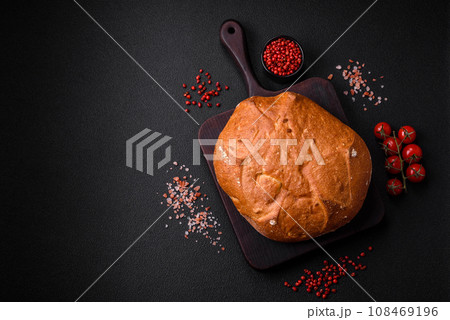 Delicious fresh crispy brown bread with seeds and grains 108469196
