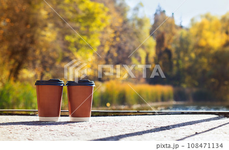 Couple Cups of coffee outdoors in autumn. 108471134
