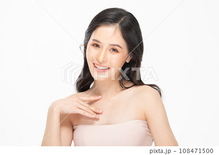 Beautiful Asian young woman touching soft cheek smile with clean fresh skin Happiness and cheerful with positive emotional,isolated on white background,Beauty Cosmetics and Facial treatment Concept Beautiful Asian young woman touching soft cheek smile with clean fresh skin Happiness and cheerful with positive emotional,isolated on white background,Beauty Cosmetics and Facial treatment Concept 108471500